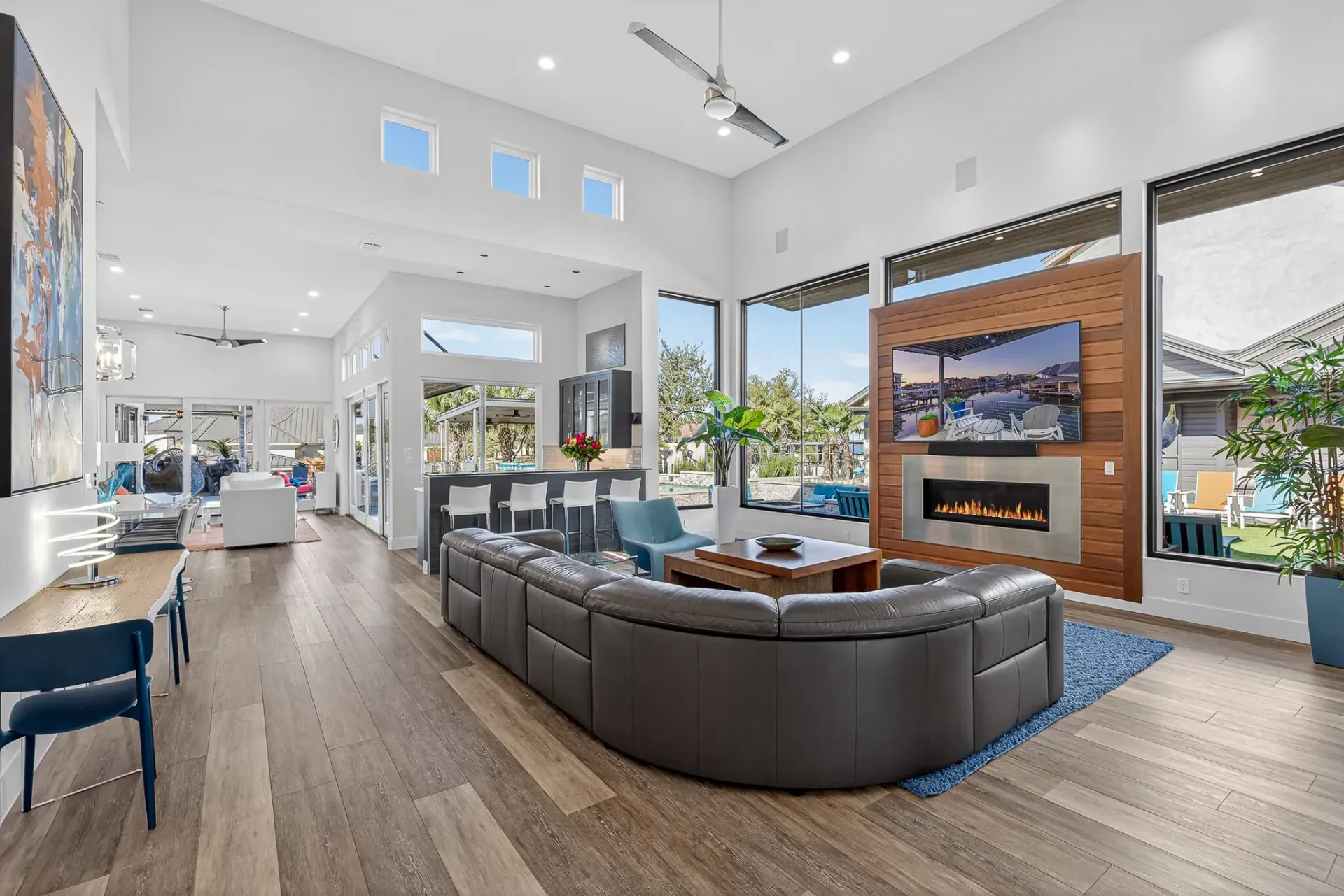 Open living room with fireplace and bar area